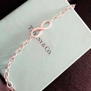 Tiffany and Co Infinity bracelet (far left)